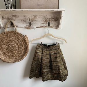 Pleated metallic mini skirt